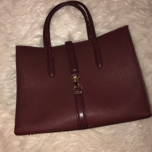 Burgundy hand bag